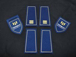 Embossed badges and epaulets